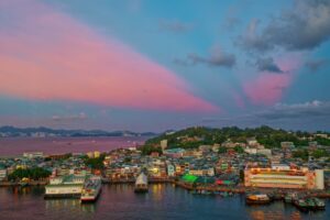 Cheung Chau and sunset tinted clouds, Hong Kong - DocMartin photo print